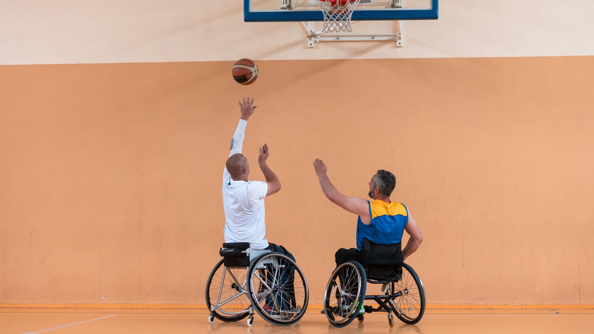 Two Men Playing Wheelchair Basketball